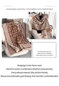 Detailed close-up of vintage paisley jacquard scarf with thick warm fringe details