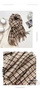 Detailed view of lilac plaid cashmere-feel scarf with fringe edges and soft texture