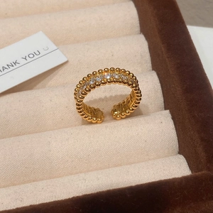 Elegant gold-plated open ring with white zircon stones and beaded edges in a gift box