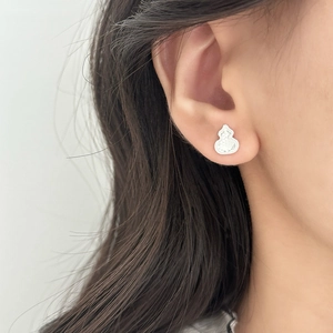 Elegant vintage silver gourd stud earrings with intricate texture worn by a model
