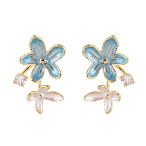 Elegant French blue and white flower stud earrings with gold accents and zircon stones