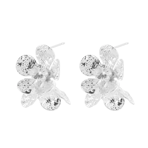 Elegant hammered texture silver flower earrings with sparkling central zircon stones