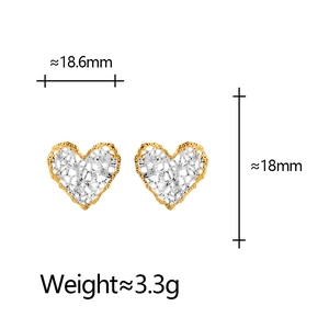 Irregular hollow heart stud earrings in gold and silver finish showing 18mm dimensions