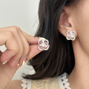 French vintage silver hollow flower stud earrings with sparkling cubic zirconia crystals
