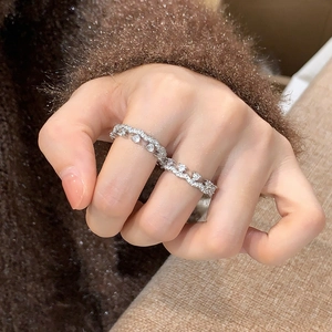 Luxurious silver crown wave ring featuring double rows of sparkling pavé cubic zirconia