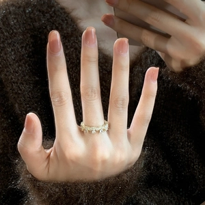 Elegant gold crown ring for women with wave design and white cubic zirconia accents