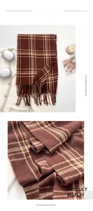 Macro view of thick lilac plaid imitation cashmere scarf with soft tassel edges
