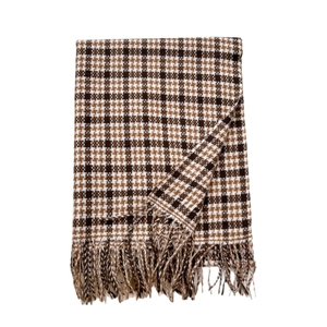 Classic brown and white plaid scarf with decorative fringe for winter warmth