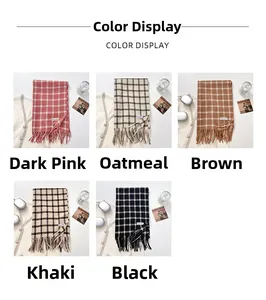 Detail of five colored plaid fringe scarves showing woven texture and soft tassels