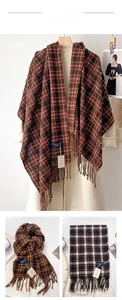 Detailed macro view of deep brown plaid scarf with fringe tassels and soft fabric texture