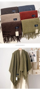 Dettaglio macro della sciarpa classica a quadri in finto cashmere con frange ai bordi