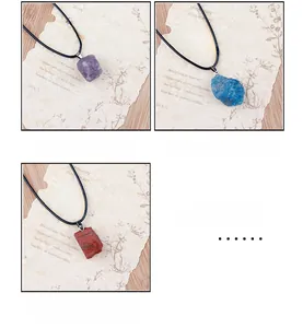 Close-up of Amethyst Blue Apatite and Red Jasper raw stone pendants with black cords
