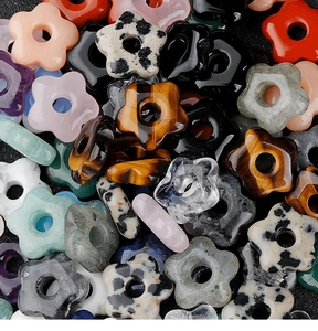 Macro shot of colorful star-shaped natural stone beads for DIY jewelry making