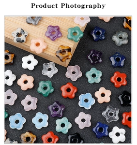 Macro shot of flower-shaped natural stone beads with center holes for DIY jewelry