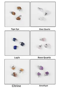Macro view of six irregular raw gemstone pendants with silver-plated metal caps and loops