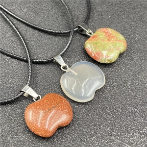 Three natural crystal apple pendants on cord necklaces including unakite and opalite stones