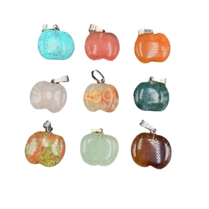 Nine colorful apple-shaped natural stone pendants with metal bails on a white background