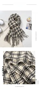 Detailed view of plaid imitation cashmere scarf featuring fine fringe and soft texture