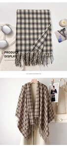 Detail of plaid imitation cashmere scarf with tassels styled on a long cream coat