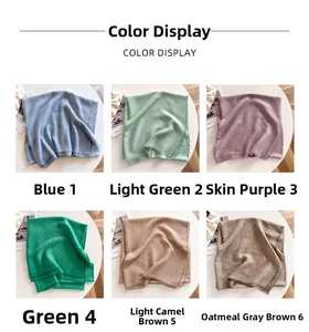 Color display of lightweight solid shawls with fringe edges in six assorted soft tones