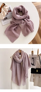 Close-up of light purple lightweight scarf with delicate short fringe detail and soft texture