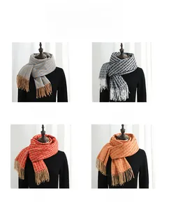 Detailed view of knitted clover tassel scarves in four colors with jacquard texture