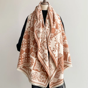 Retro baroque jacquard shawl with tassels in caramel and beige, shown on a mannequin