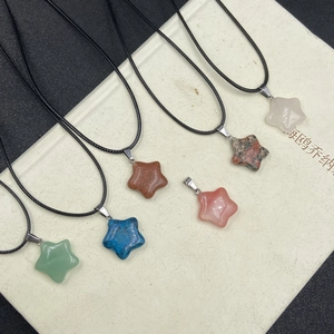 Set of six natural star stone pendants including lapis and quartz on black wax cords