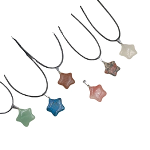 Natural star-shaped stone pendants with woven cords in assorted crystal and agate minerals