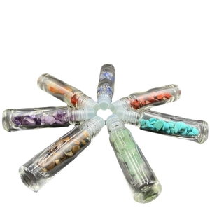 Set of 7 glass essential oil roller bottles with natural energy crystals and gemstones