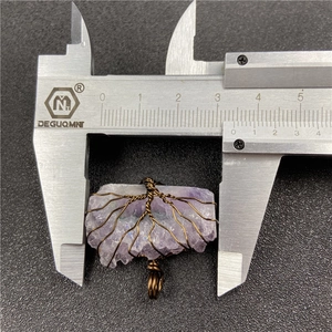 Handmade tree of life amethyst wire wrapped pendant with copper finish on measurement tool