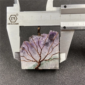 Macro shot showing dimensions of amethyst life tree pendant with 43mm digital caliper