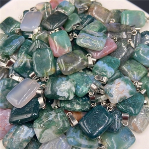 Macro detail of rectangular moss agate stone pendants with polished mineral textures