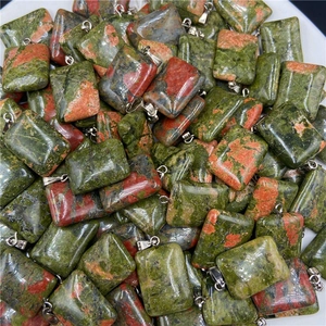 Rectangular unakite natural stone pendants with silver metal clasps on white background