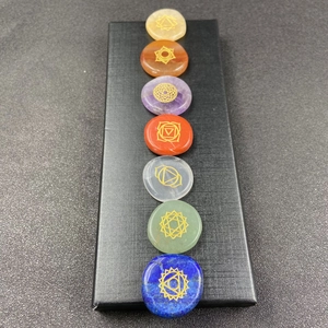 Seven chakra natural gemstone set with engraved gold symbols in a black gift box