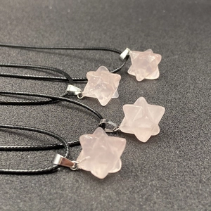 Handcrafted rose quartz Merkaba star necklaces with geometric crystal pendants