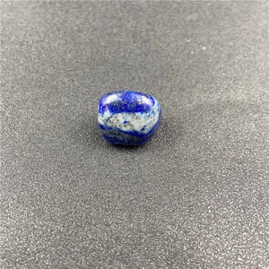 Polished blue lapis lazuli stone with golden pyrite flecks for crystal meditation