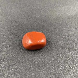Polished Red Jasper pebble stone for meditation showing natural reddish-brown textures