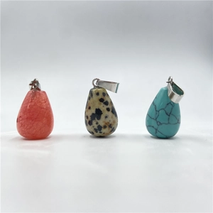 Detailed trio of teardrop natural stone pendants in pink, teal, and spotted textures
