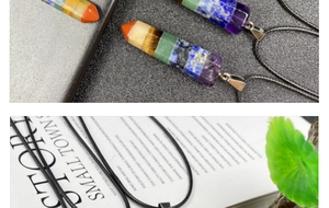 Detailed macro view of multi-layered hexagonal crystal stone pendant with leather cord