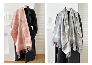 Detail of soft cashmere feel scarf with vintage toile de jouy print and fringe edges