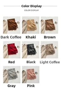 Grid display of double-sided jacquard scarves in eight colors with elegant fringe details