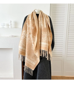Close-up of vintage forest jacquard pashmina scarf with fine tassel edge detail