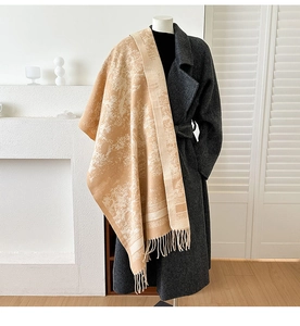 Detailed view of khaki jacquard cashmere-feel scarf with elegant fringe and floral patterns
