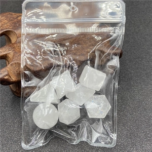 Close-up of translucent natural crystal geometric shapes in a clear storage bag