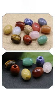 Macro detail of natural stone large hole beads showing polished texture and various colors