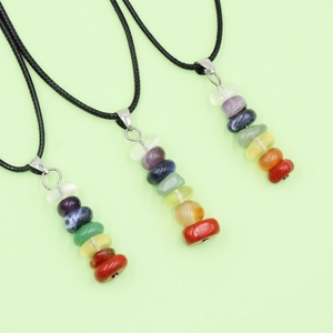 Natural seven chakra raw stone pendant necklace with black cord for meditation