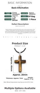 Macro detail of Tiger Eye natural stone cross pendant with dimensions 28x40x7mm