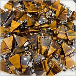 Bulk display of triangular tiger eye stone pendants with silver metal clasps