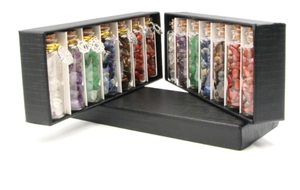 Mini glass bottles with colorful natural crystal stones in elegant black gift box